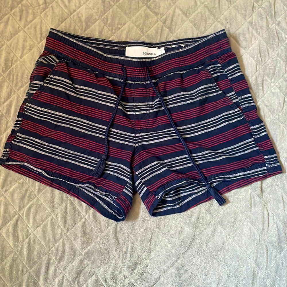red white and navy blue shorts